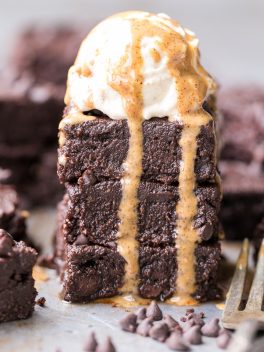These are the Ultimate Gluten Free Fudge Brownies! This easy recipe makes incredibly fudgy, melt in your mouth chocolate brownies with an optional paleo chocolate frosting on top. This recipe is refined sugar free and Paleo-friendly.