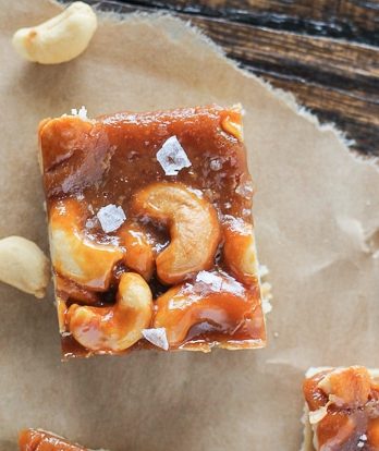 Cashew Caramel Shortbread Bars have a buttery shortbread layer topped with homemade caramel, crunchy cashews, and a sprinkle of flaky sea salt.