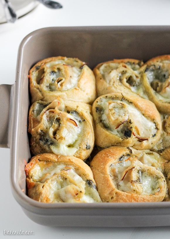 These Cheesy Turkey Pesto Rolls make a great snack or appetizer perfect for tailgating or the holidays! Gooey mozzarella makes this easy four ingredient recipe absolutely irresistible.
