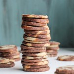 This recipe for Chocolate Vanilla Swirl Icebox Cookies makes tons of cookies that are perfect for holiday baking. They look beautiful and you can keep a roll in your fridge or freezer, ready to slice 'n bake!