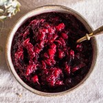 This Healthy Paleo Cranberry Sauce is simple to make, delicious, and sweetened with maple syrup to keep it refined sugar-free. Orange zest and warm spices give this cranberry sauce incredible flavor, and it's done in 15 minutes.