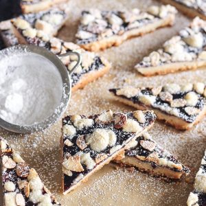 Jam Shortbread are made with just four ingredients, but they're delicious enough and impressive enough to serve to guests or on a holiday cookie platter. This easy recipe will become a holiday favorite.