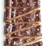 These Brown Butter Shortbread with Dark Chocolate + Sea Salt are full of simple, good quality ingredients for a sandy shortbread cookie that's the perfect addition to any holiday party. Dark chocolate and a sprinkle of good sea salt make this shortbread even more irresistible!