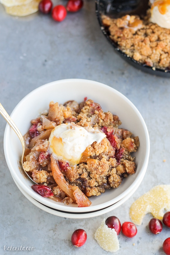 This Pear Cranberry Ginger Crisp is a mix of sweet, tart, and little spicy with a buttery shortbread cookie crumble! This festive holiday dessert is gluten-free and doubles easily.