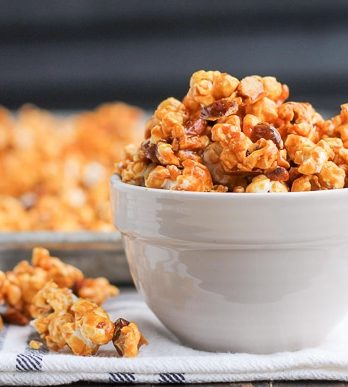 This Salted Honey Almond Caramel Corn is an addictive snack you can give as a gift or serve to a crowd. This caramel corn is made without corn-syrup and uses honey instead - it also has a sprinkle of sea salt!