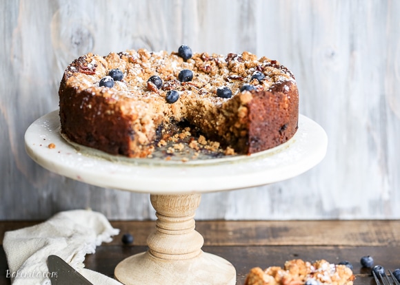 This Blueberry Crumb Cake has a thick layer of pecan crumble atop a flavorful cake that is bursting with fresh blueberries! This cake is perfect dusted with powdered sugar or served with a bit of whipped cream.