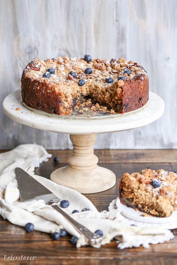 This Blueberry Crumb Cake has a thick layer of pecan crumble atop a flavorful cake that is bursting with fresh blueberries! This cake is perfect dusted with powdered sugar or served with a bit of whipped cream.