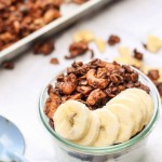 This Chocolate Banana Granola is super chocolatey with mashed banana and banana chips! This gluten-free and vegan granola makes a super addictive snack or breakfast.