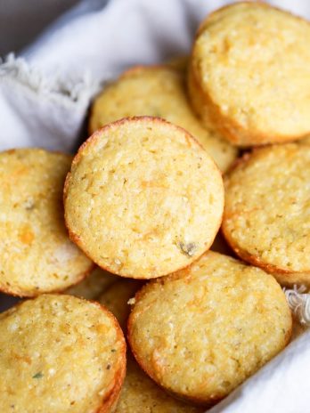 These Green Chile Corn Muffins are the best corn muffins I've ever had! Flavored with green chiles & cheddar cheese, they are perfect served with a bowl of chili or a drizzle of honey.