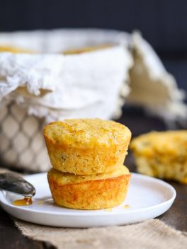 These Green Chile Corn Muffins are the best corn muffins I've ever had! Flavored with green chiles & cheddar cheese, they are perfect served with a bowl of chili or a drizzle of honey.