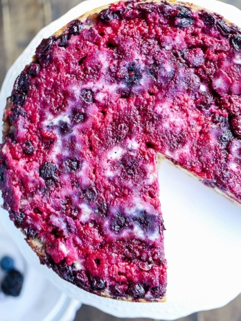 This Berry Upside Down Cake highlights the bright flavor of fresh berries and has a layer of cinnamon crumb swirl in the center!