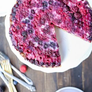 This Berry Upside Down Cake highlights the bright flavor of fresh berries and has a layer of cinnamon crumb swirl in the center!