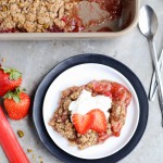 This Strawberry Rhubarb Crisp combines tart rhubarb and sweet strawberries, topped with a pistachio crumble topping! This crisp is Paleo-friendly, gluten-free, and vegan.