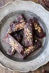 These easy no-bake Chocolate Covered Almond Butter Puffed Millet Bars are the perfect breakfast treat or snack! This gluten free, refined sugar free, and vegan recipe has only seven ingredients.