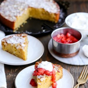 This Gluten Free Honey Cornmeal Cake with Strawberry Compote + Honey Whipped Cream is a gorgeous dish that's perfect for dessert or brunch!