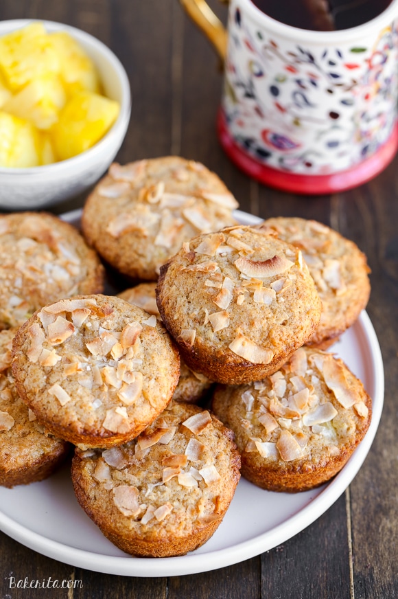 Have a taste of the tropics with these Vegan Pineapple Coconut Muffins! They're super soft, full of tropical flavor, and no one would ever guess that they are dairy-free + vegan.