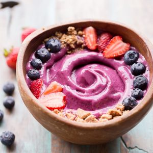This Berry Pitaya Smoothie Bowl is made from mixed berries, banana, and pitaya - also known as dragonfruit! Top with fresh fruit and other toppings for a nutritious and delicious breakfast or brunch.