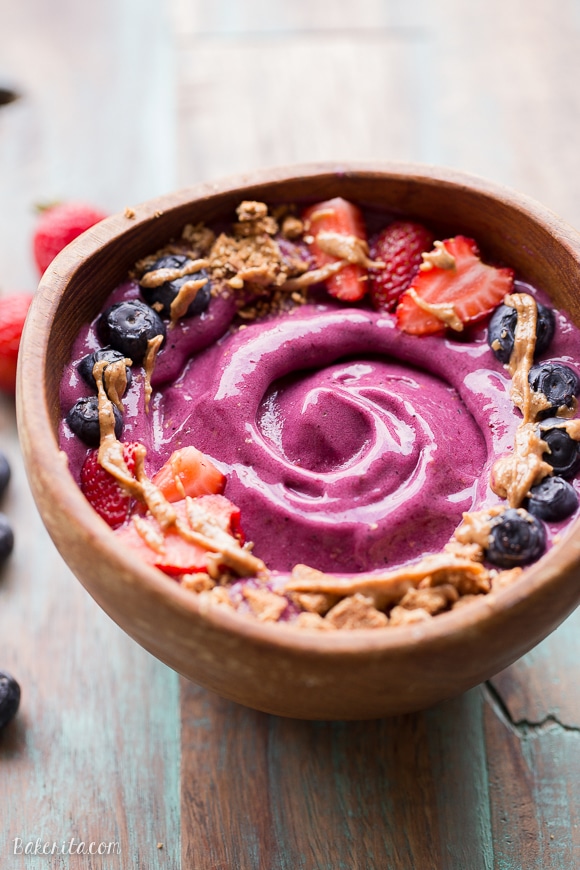 This Berry Pitaya Smoothie Bowl is made from mixed berries, banana, and pitaya - also known as dragonfruit! Top with fresh fruit and other toppings for a nutritious and delicious breakfast or brunch.