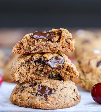 These Paleo Cherry Almond Chocolate Chunk Cookies are chewy, gooey, and absolutely delicious! These gluten-free and refined sugar-free cookies are loaded with toasted almonds, dried Bing cherries and dark chocolate chunks, sprinkled with flaky sea salt.