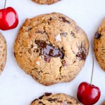 These Paleo Cherry Almond Chocolate Chunk Cookies are chewy, gooey, and absolutely delicious! These gluten-free and refined sugar-free cookies are loaded with toasted almonds, dried Bing cherries and dark chocolate chunks, sprinkled with flaky sea salt.