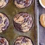 These Chocolate Peanut Butter Banana Muffins are loaded with chocolate chunks and have a peanut butter swirl - you'd never guess that they're gluten-free and the batter is sweetened entirely with bananas!