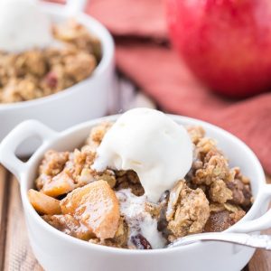 This Oatmeal Cookie Apple Crisp has a simple spiced apple filling, topped with a super easy oatmeal cookie crumble topping! Serve it warm with vanilla ice cream for an outstanding quick dessert.