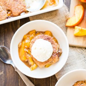 This Peach Cobbler has a crispy, fluffy topping with a simple peach filling - it's the most perfect summer dessert! This is a gluten-free, Paleo, and vegan treat that you don't want to miss.