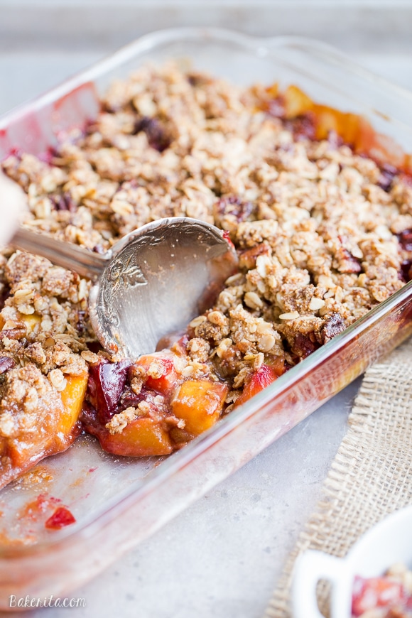 This Summer Stone Fruit Crisp features lightly sweetened peaches, plums, and nectarines topped with a oatmeal pecan crumble topping. This gluten-free and vegan dessert showcases the best of summer!