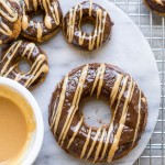 These Peanut Butter Banana Donuts have a dark chocolate glaze topped with a drizzle of peanut butter! They're baked instead of fried, and they are gluten-free, refined sugar-free, and vegan, making them way healthier than your average donut.