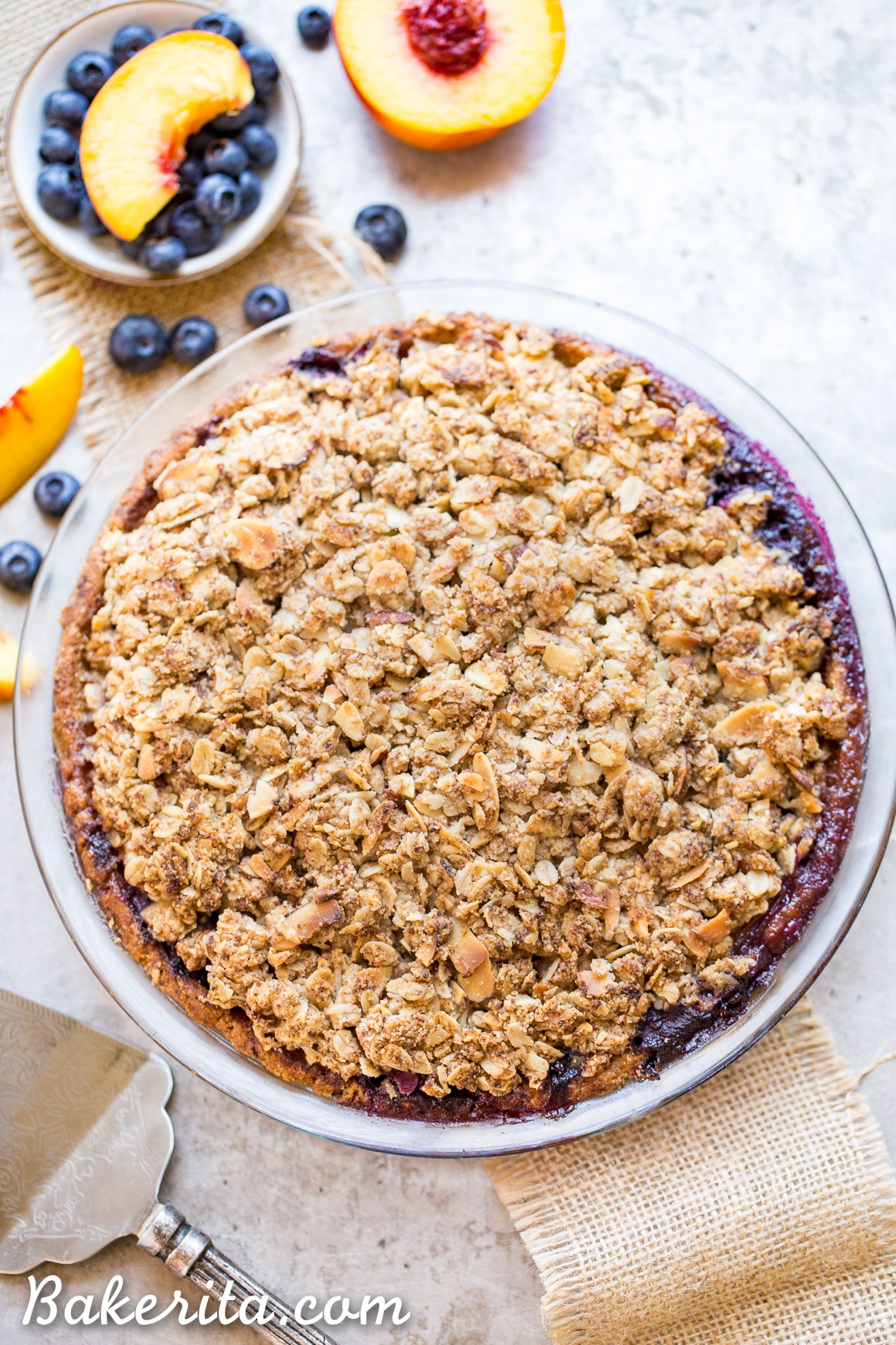 This Blueberry Nectarine Pie is the epitome of summer, and it has a delicious oatmeal almond crumble on top! This gluten free and refined sugar free pie is sure to be a favorite.