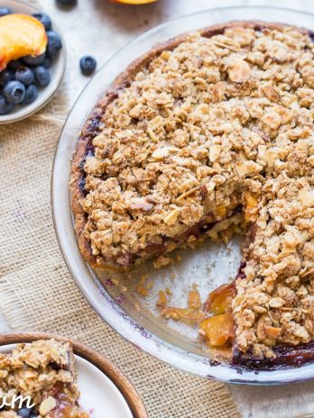This Blueberry Nectarine Pie is the epitome of summer, and it has a delicious oatmeal almond crumble on top! This gluten free and refined sugar free pie is sure to be a favorite.