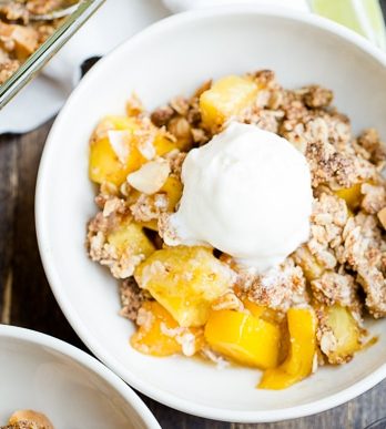 This Mango Pineapple Crumble has an irresistible coconut macadamia nut crumble topping. This is a gluten-free, vegan, and refined sugar free crumble that will bring your tastebuds to the tropics!
