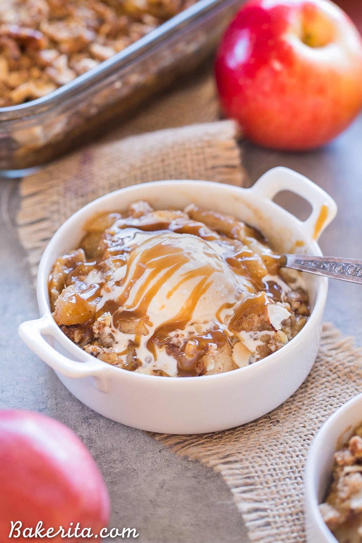 This Pear Apple Crisp combines two of the best fall fruits into one delicious crisp, flavored with vanilla, cinnamon and ginger and topped with a grain-free crumble topping. This crisp is gluten-free, Paleo, and vegan.