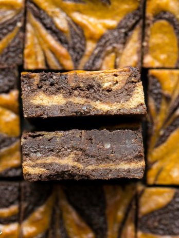 These Pumpkin Cheesecake Brownies are moist + fudgy brownies with a swirled layer of spiced pumpkin cheesecake! These brownies are gluten-free and refined sugar free.