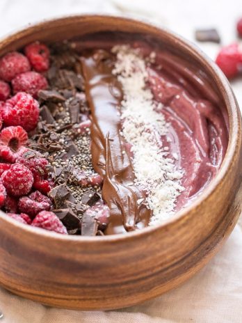 This Raspberry Acai Bowl is a refreshing & delicious breakfast, especially when you add your favorite toppings! This healthy breakfast is ready in a few minutes.