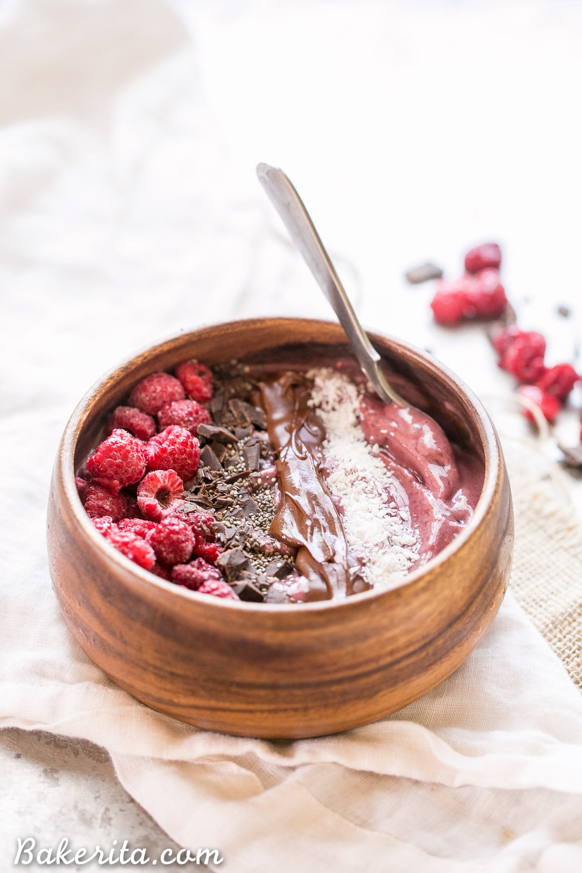 This Raspberry Acai Bowl is a refreshing & delicious breakfast, especially when you add your favorite toppings! This healthy breakfast is ready in a few minutes.
