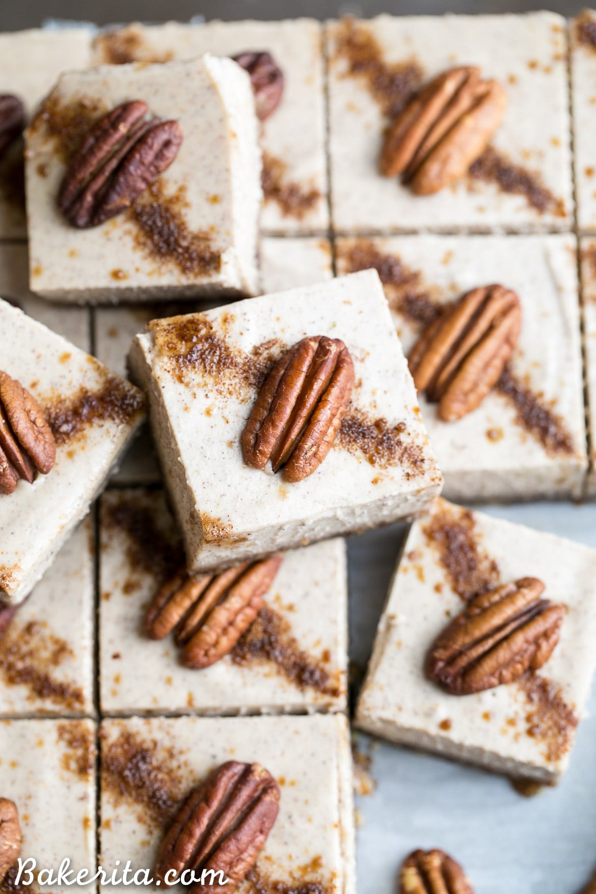 These Chai Cheesecake Bars are tangy and full of spicy chai flavor - they have a vegan cashew cheesecake filling and a pecan date crust. These creamy cheesecake bars are gluten-free, paleo, vegan, and there's no baking required!