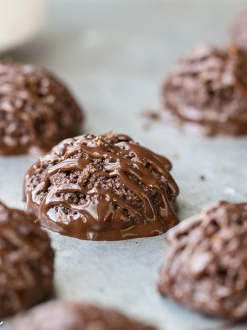 These rich Double Chocolate Macaroons are made super chocolatey with both cocoa powder and melted chocolate. These easy cookies are dipped and drizzled with chocolate, and they're gluten-free, Paleo + vegan.