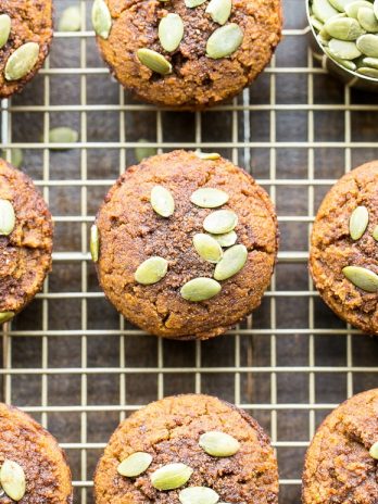 These Paleo Pumpkin Muffins, made with coconut flour and almond butter, are moist, fluffy, and lightly spiced with cinnamon and nutmeg. These healthy muffins make a great breakfast or snack and freeze well.