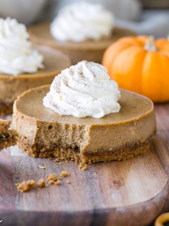 These Mini Pumpkin Cheesecakes have a crunchy, salty pretzel crust that pairs irresistibly well with the spiced pumpkin cheesecake filling! Topped with a swirl of whipped cream, this is a gluten-free dessert everyone will go nuts for - it's perfect for the holidays.