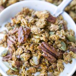 This Pumpkin Granola is a simple, crunchy granola that makes the perfect Fall breakfast! Made with pecans, pepitas, and maple syrup, you won't be able to stop snacking on this gluten free and vegan granola.
