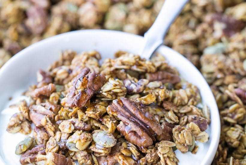 This Pumpkin Granola is a simple, crunchy granola that makes the perfect Fall breakfast! Made with pecans, pepitas, and maple syrup, you won't be able to stop snacking on this gluten free and vegan granola.