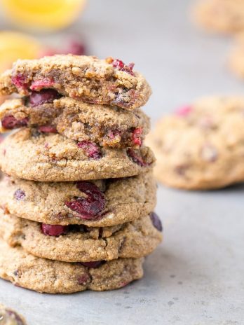 These Gluten-Free Cranberry Orange Cookies are soft, chewy and bursting with flavor! They're loaded with cinnamon, orange zest, fresh tart cranberries, and chewy dried cranberries. Perfect for the holidays!
