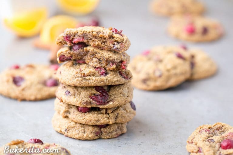 These Gluten-Free Cranberry Orange Cookies are soft, chewy and bursting with flavor! They're loaded with cinnamon, orange zest, fresh tart cranberries, and chewy dried cranberries. Perfect for the holidays!
