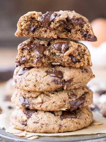 These Paleo Almond Coconut Chocolate Chunk Cookies are made with almond butter and big chocolate chunks for super gooey, decadent cookies! These gluten free and refined sugar free cookies will definitely satisfy your cookie craving.