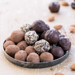 With toasted almonds for crunch and a sprinkle of sea salt on top, these Salted Almond Chocolate Truffles are a chocolate lover's dream! They're easy to make, Paleo-friendly, and vegan. A batch of these truffles makes the perfect holiday gift.