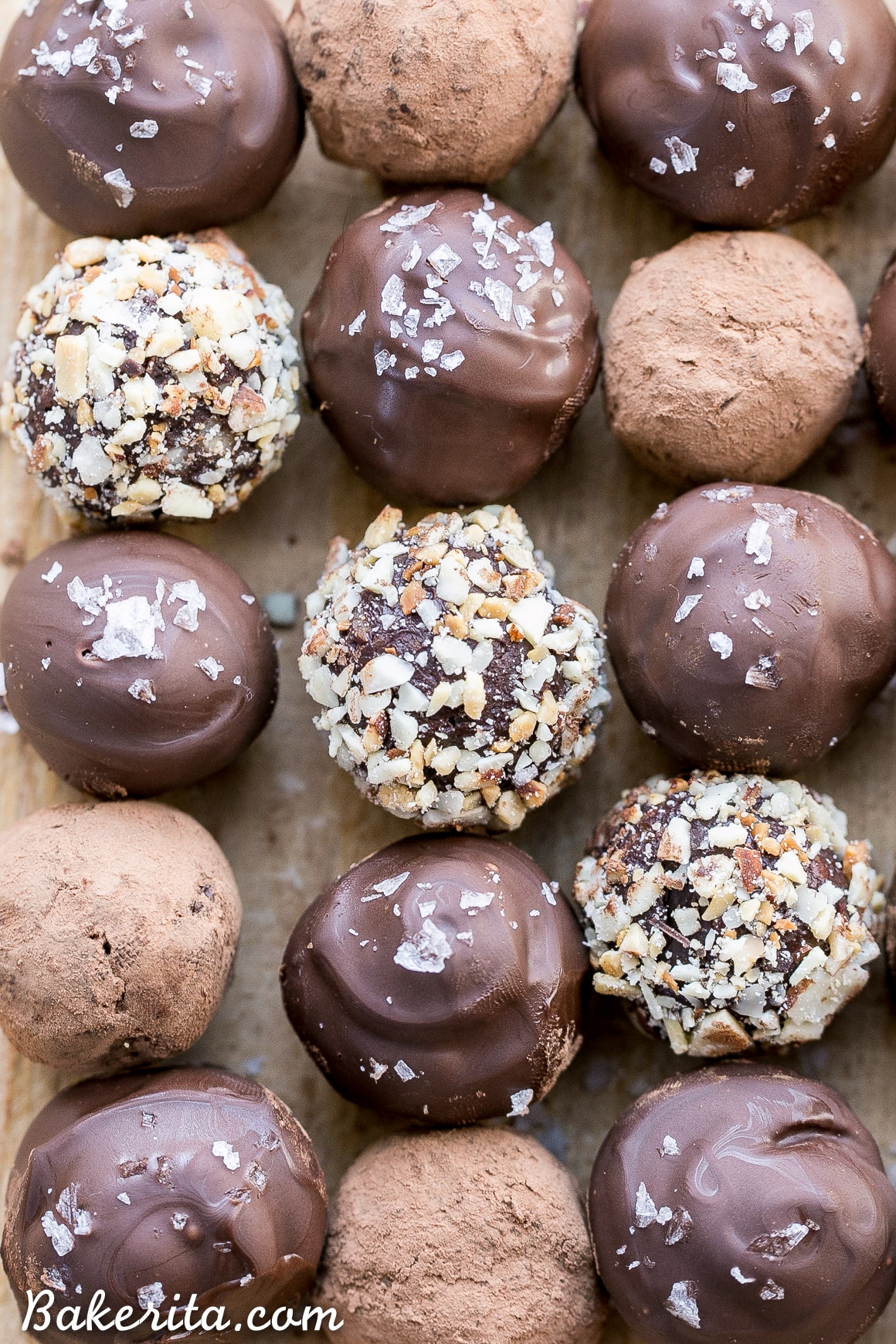 With toasted almonds for crunch and a sprinkle of sea salt on top, these Salted Almond Chocolate Truffles are a chocolate lover's dream! They're easy to make, Paleo-friendly, and vegan. A batch of these truffles makes the perfect holiday gift.
