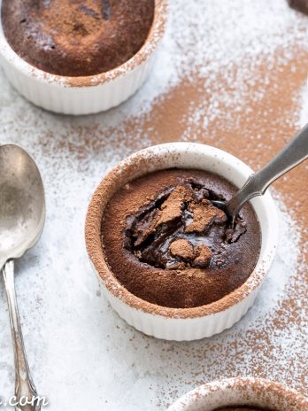These Paleo Chocolate Melting Cakes are incredibly gooey, rich and chocolatey! This easy, five-ingredient recipe is a healthier take on Carnival's Chocolate Melting Cake. You'll love the melting, gooey center!