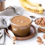 You'll want to spread this Banana Bread Pecan Almond Butter on everything! This creamy nut butter, made from pecans and almonds, tastes like a spreadable version of banana bread, loaded with cinnamon, nutmeg, and dried banana bits. There's no sugar added in this vegan, Paleo, + Whole30-approved treat.