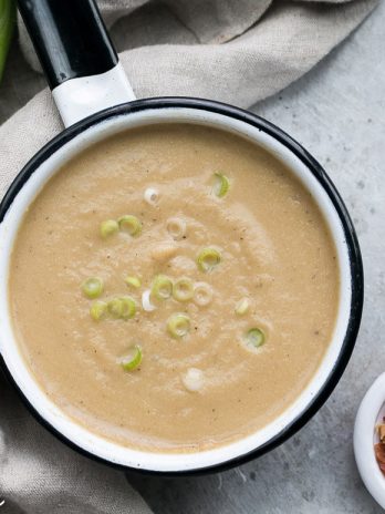 This Cauliflower Leek Soup tastes just like potato leek soup - it's incredibly flavorful and super creamy without ANY dairy needed! Made in just 30 minutes, this Paleo + Whole30-approved soup will definitely warm you up and satisfy - it's also easily made vegan.